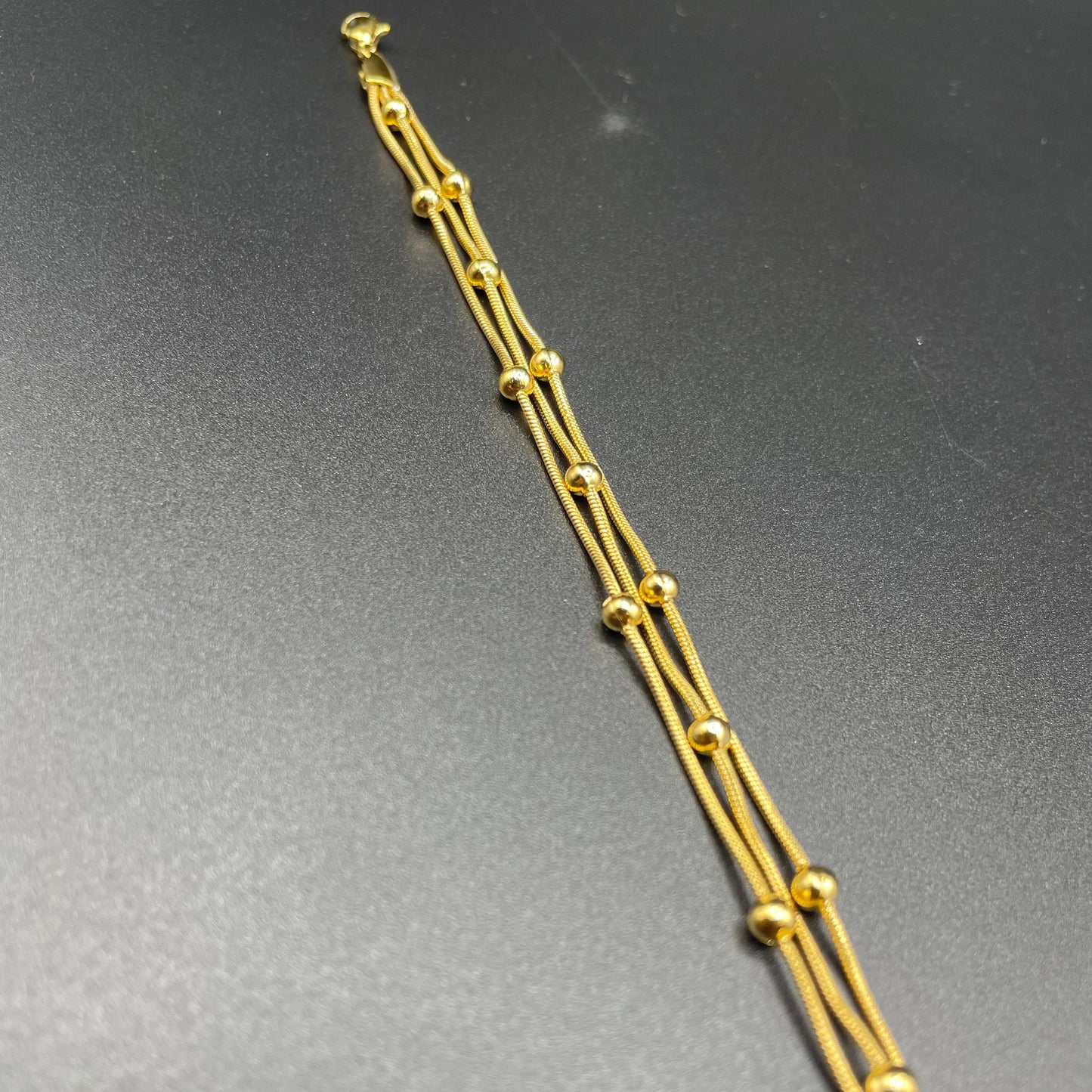 Elegant Luxury Gold Design Triple Layer Snake Bone Bead Bracelet